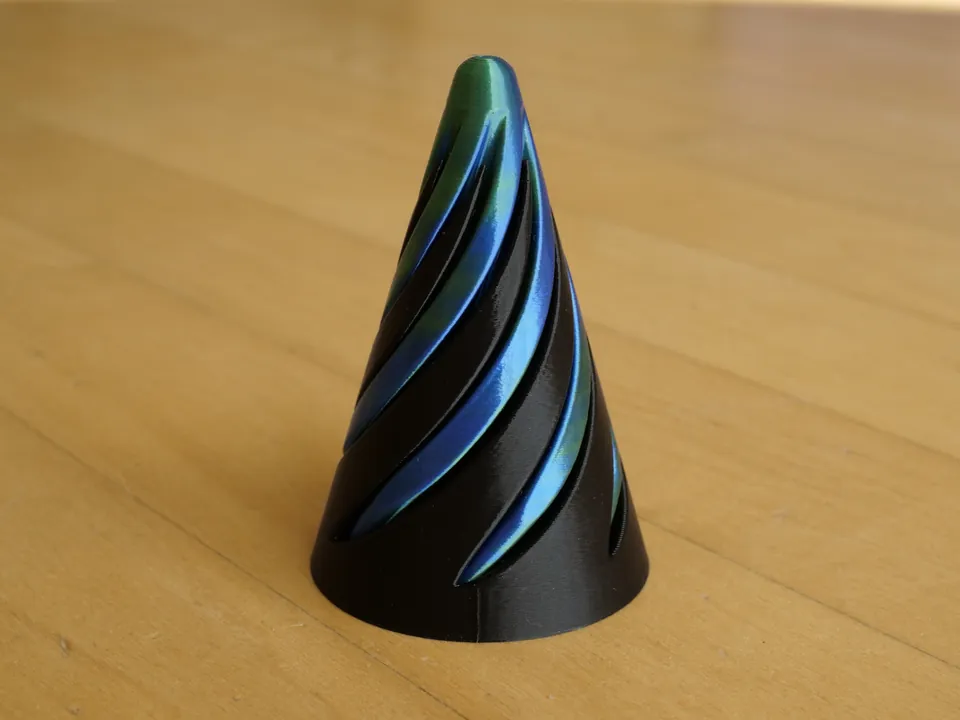 Black spiral cone fidget with a blue twist