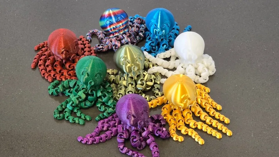 Pile of colorful articulated octopus toys